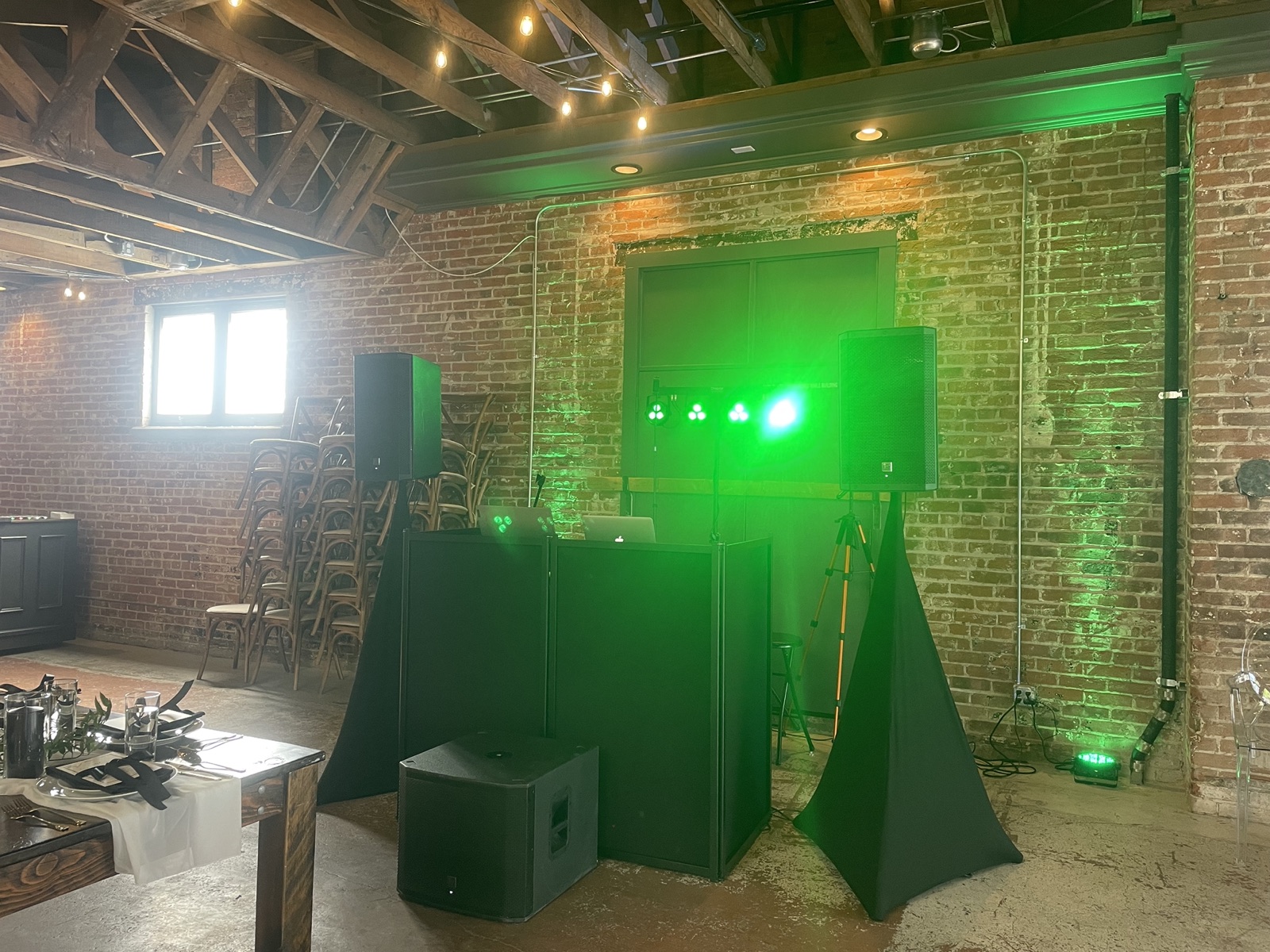 JWoo DJ booth and speakers at Alex and Matt’s wedding at The St. Vrain in Longmont