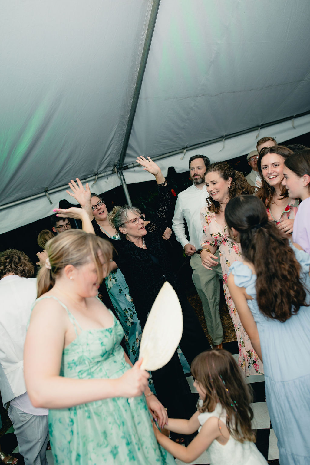 Guests gathered together on the wedding dance floor